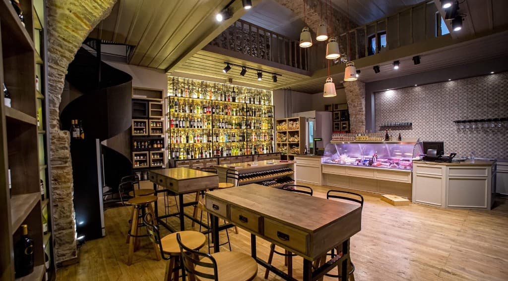 Mediterraneo Wine and Deli interior, wine wall and tasting tables